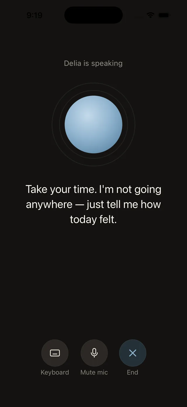 The real voice-chat screen on iPhone: “Delia is speaking — take your time, I'm not going anywhere, just tell me how today felt.”